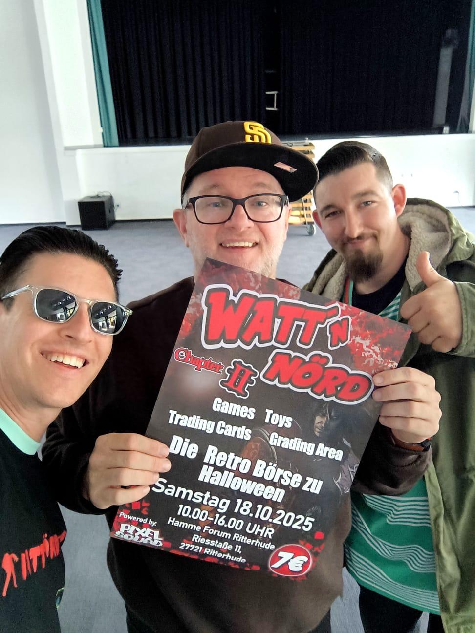 Teamfoto mit dem roten Flyer der zweiten WATT’N’NÖRD